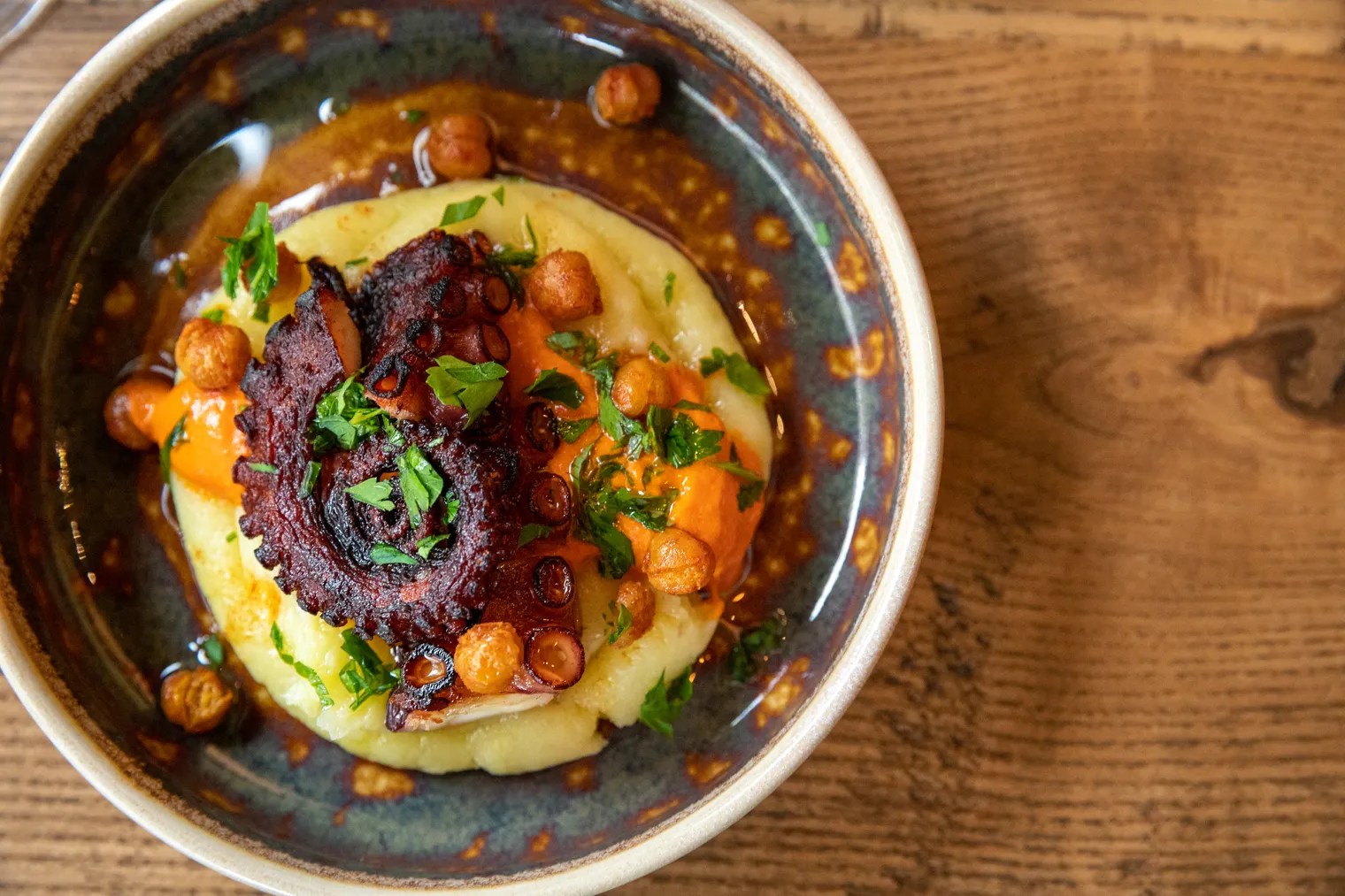 The Spanish octopus with yukon gold potato, piquillo pepper, and chickpeas at Las Ramblas tapas restaurant in Raleigh